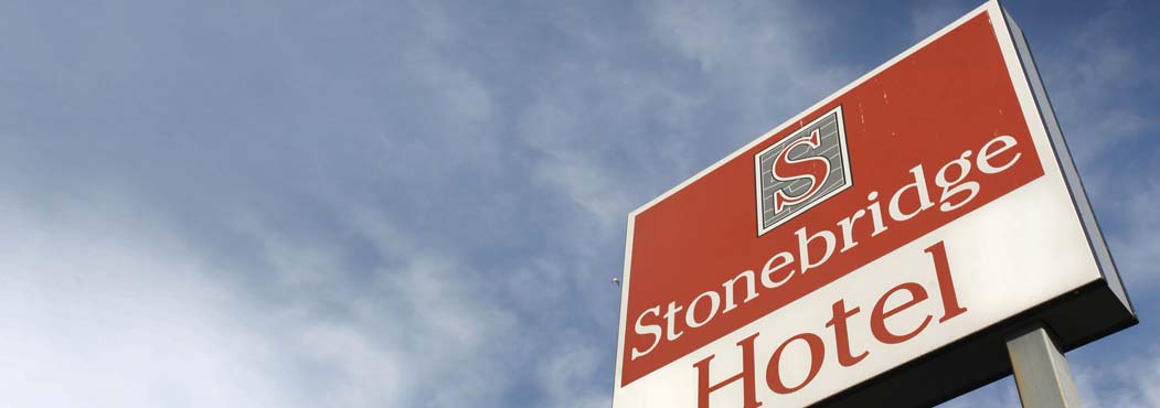 letter S for Stonebridge Hotel red & white sign in Fort St. John